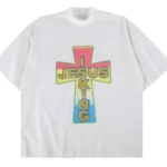 A stylish T-shirt featuring the "Jesus is King" design with white print by Kanye West. The shirt combines religious symbolism with fashion, displaying bold lettering and unique visual elements.